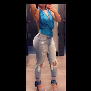 KanCan ripped paint splatter jeans.  Size 24